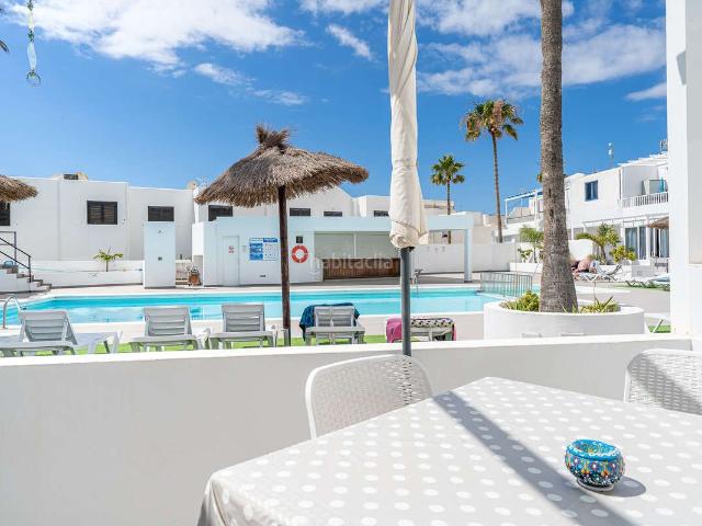 Piso en venta en Tías, Puerto del Carmen. Exclusiva propiedad con terraza y piscina en Puerto del Carmen. Pisos.