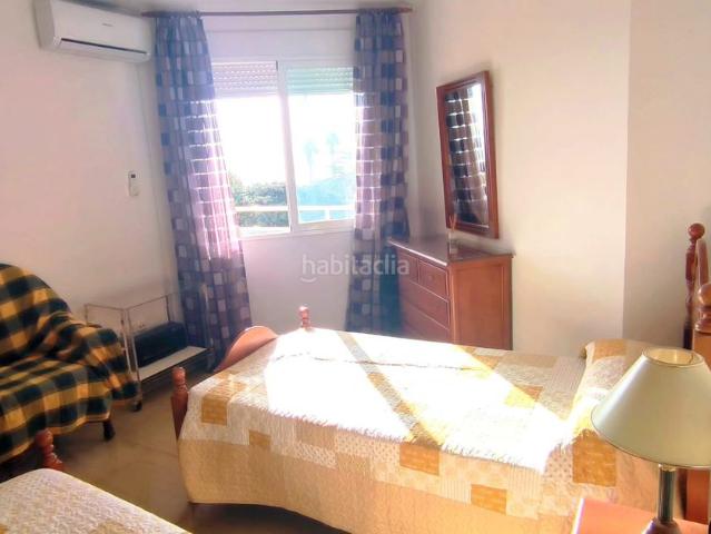 Piso en venta en Torremolinos, La Carihuela Los Nidos. piso de 2 dormitorios con piscina, primera línea de Carihuela, garaje y trastero, vistas. Pisos.