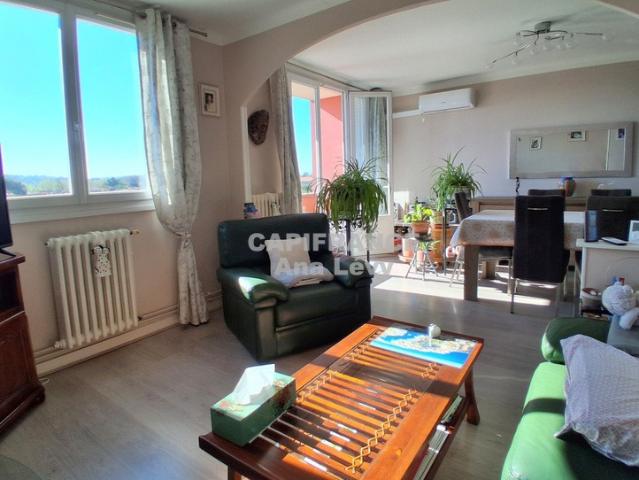 Portet village 3 pièces 66 m² avec balcon cave et parking