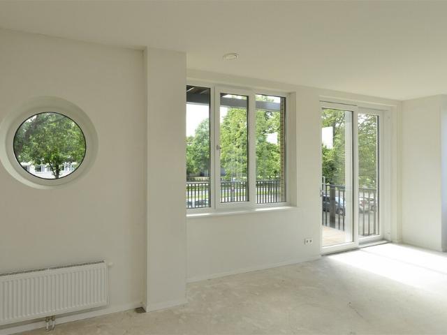 Portiekflat, appartement te huur in Huizen