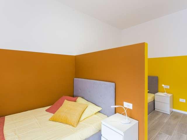 Posto letto in affitto in appartamento con 2 camere da letto a Milano