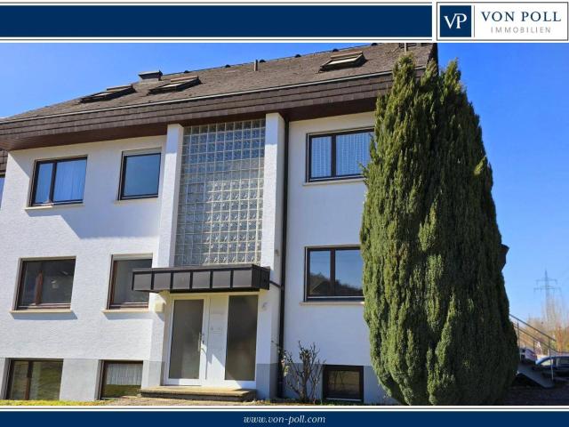 Potenzial und Möglichkeiten: 3 bis 4 Parteienhaus mit ELW in ruhiger Lage
