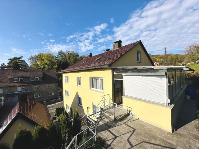 Rendite und Lebensqualität: Mehrfamilienhaus mit Nebengebäude und vielseitigem Grundstück