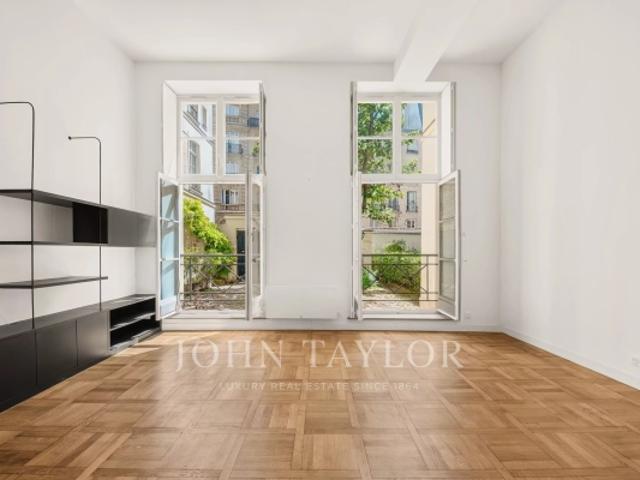 Place des Vosges – Élégant appartement en duplex au cœur d'un quartier emblématique