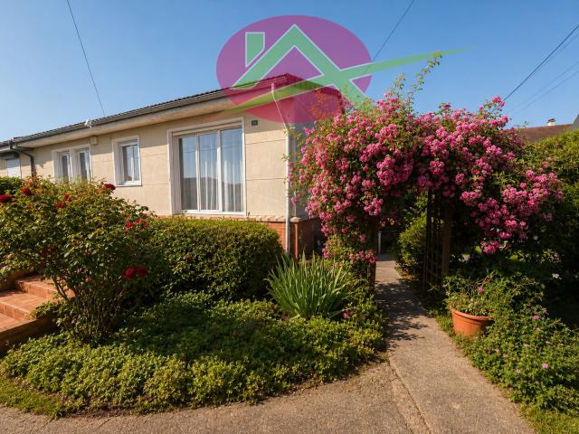 Plain pied surélevé avec garage et jardin à Oissel dans secteur recherché