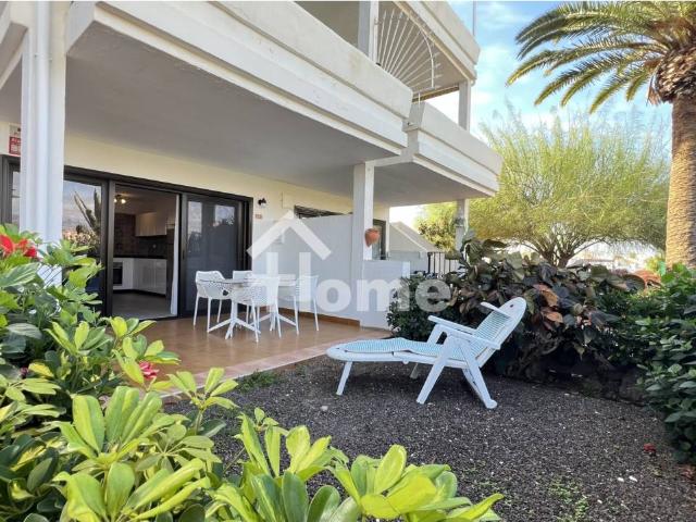 Planta baja con jardín y vistas al golf en Amarilla Golf