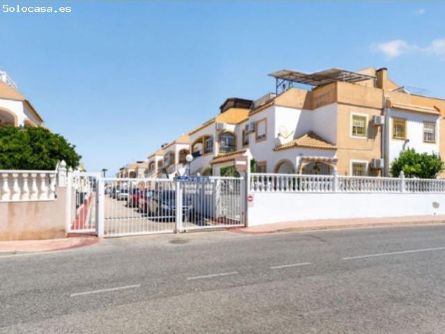 PLANTA BAJA DE 2 DORMITORIOS CON TERRAZA, PATIO Y PISCINA COMUNITARIA EN