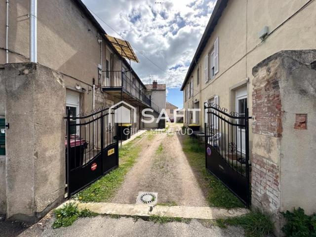 Proche centre Immeuble 8 appartements + 7 garages