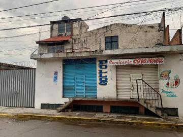 Propiedad mixta: vivienda + 2 locales comerciales + 550 m² construidos