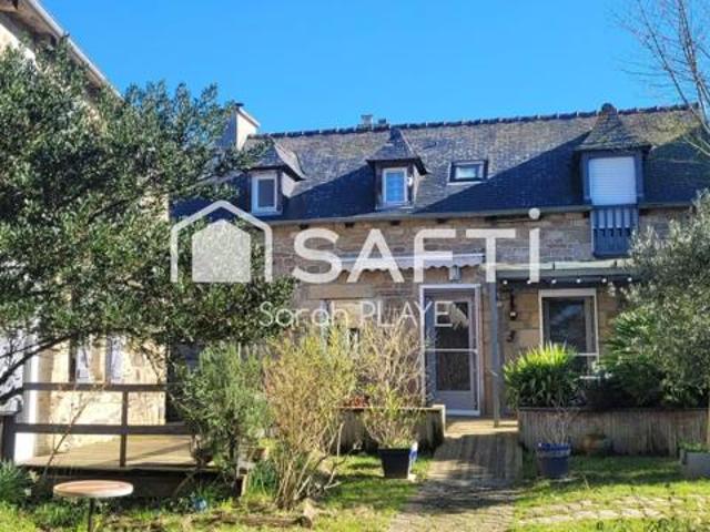 Propriété composée de deux maisons habitables, un garage, un atelier, édifiée sur un terrain de 1240m2