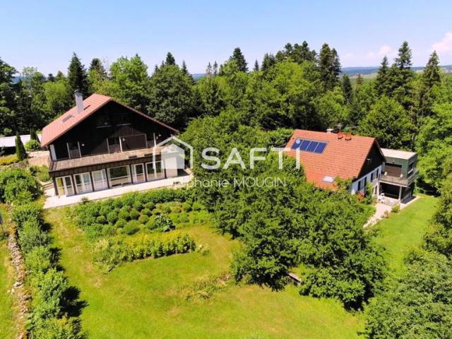 Propriété d'exception au coeur du Pays Horloger – Un domaine unique de plus de 805 m² habitables dans un ecrin de verdure