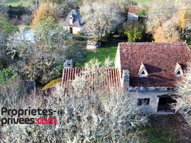 Propriété en pierre 2 maisons indépendantes, piscine, dépendances, terrain de près d'1 Hectare Catus