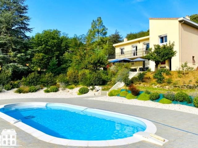 Propriété de Surface Habitable de 248 M² avec piscine dans un parc arboré de 7 149 M² 66 500 PRADES à proximité du Centre et des commodités