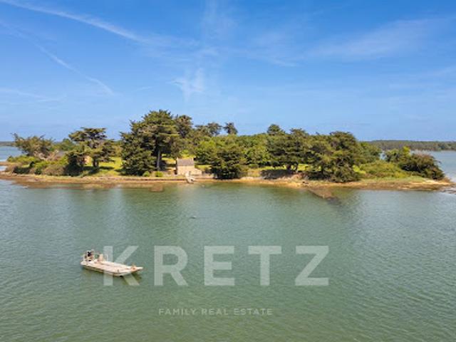 Propriété en bord de mer avec jardin
