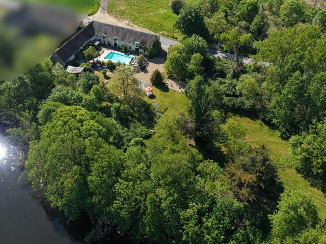 Propriété rare en confluence de rivières 3,2 hectares avec piscine et potentiel d’activité