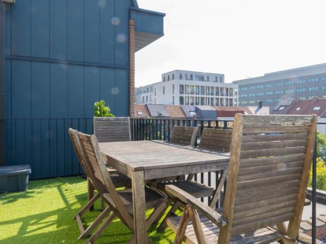 Prachtig afgewerkte duplex met groot terras centraal te Gent