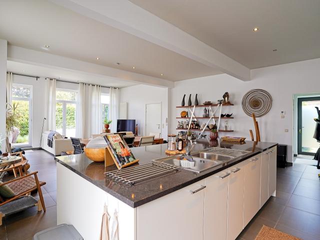 Prachtig gelijkvloers appartement met terras en tuin in het centrum van Buggenhout