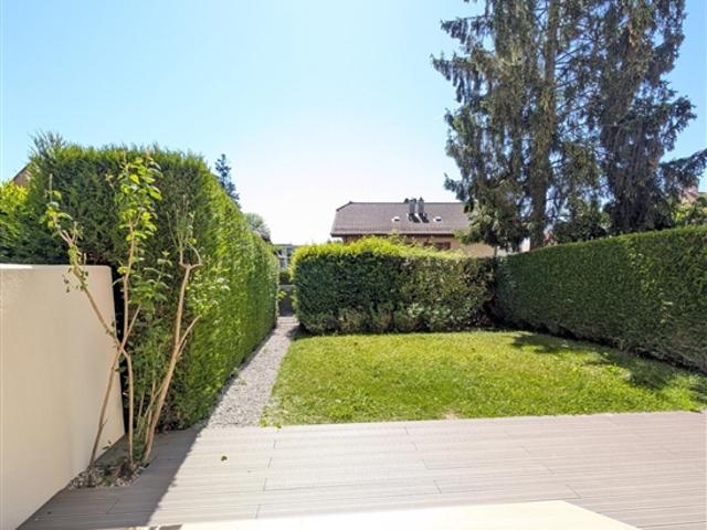 Prächtige renovierte 4,5 Zimmer Wohnung mit Terrasse und privatem Garten