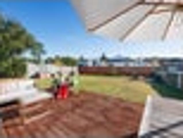 Practical Coastal Charm with Utility Space