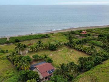 Precio Reducido! Amplio Lote Frente Al Mar Con Casa En Las Tablas
