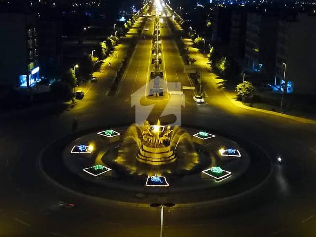 Premium location 10 marla residential plot with possession utility charges paid is available for sale in tauheed block, sector e, bahria town, lahore