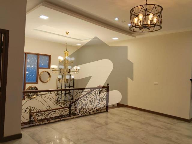 Premium 1000 Yard Bungalow Offering Generou Living Spaces, Six Spacious Bedroom With Lawn In DHA Phase 6 Khy e Muhfiz DHA Phase 6