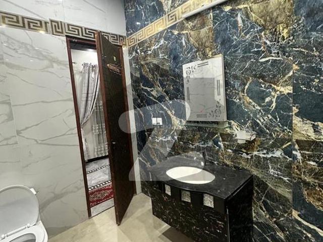 Premium 1 Kanal Luxury Designer House with Basement & Main Lawn MPCHS Block B