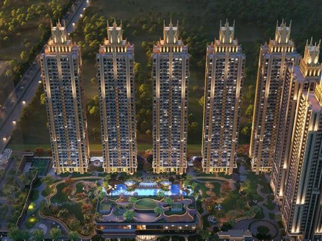 Premium 3 BHK apartments in Yamuna Expressway with clubhouse, swimming pool, and landscaped gardens