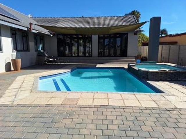 presenting a luxurious 4 bedroom hom.