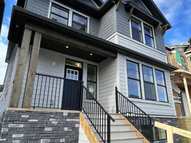 PRIVATE ENTRY+2 BDRMS BASEMENT SUITE + LIVING ROOM+1 BATHS+LAUNDRY
