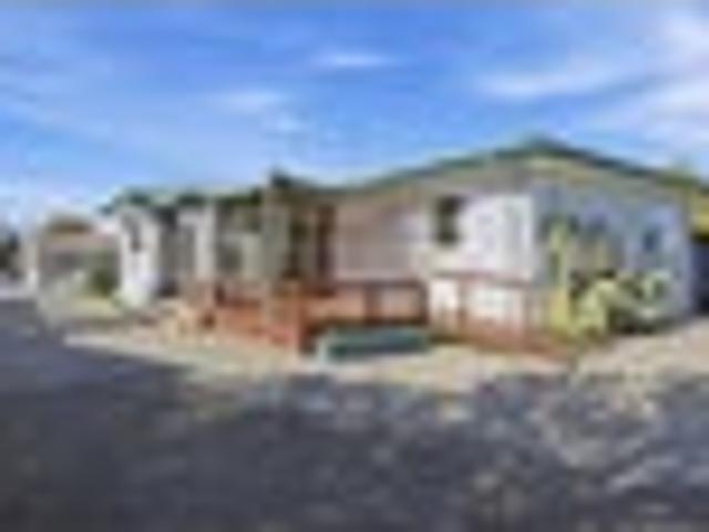 Prime and Central Location with 4 Car Garaging