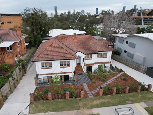Prime Investment Duplex with High Yield and Future Growth Potential across 2 lots
