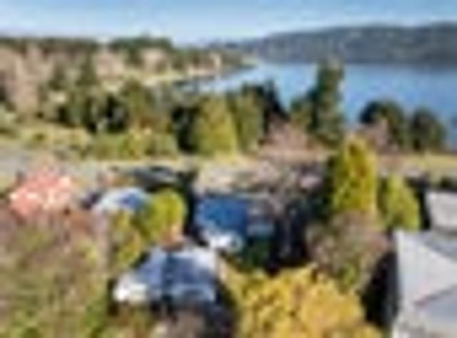 Prime Lakefront Renovation Opportunity
