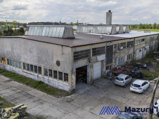 Przemysłowa nieruchomość 2064 m2 z halami i ogrodzeniem