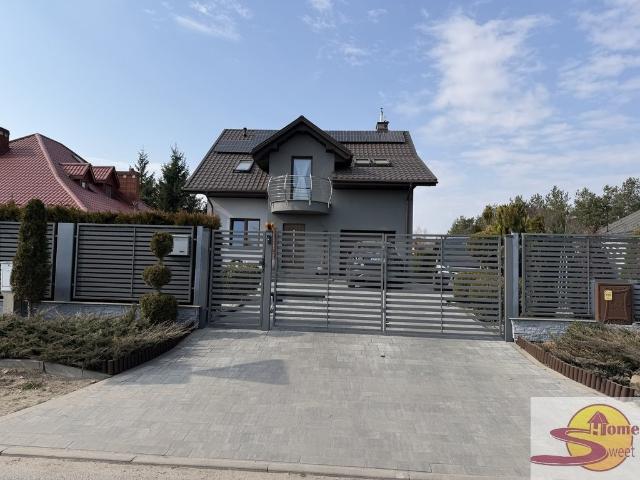 Przestronny dom 110 m2 z garażem, ogród i balkon