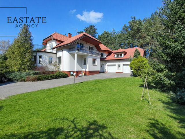 Dom wolnostojący 370 m², garaż, 2300 m² działki