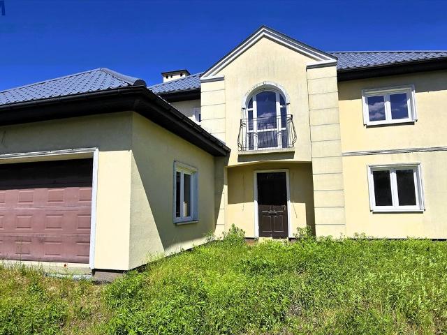 Dom z dużą działką i garażem w Grodzisku Mazowieckim