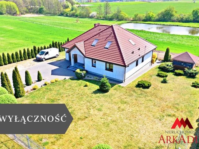 Przestronny dom z garażem i możliwością dokupienia działki ze stawem