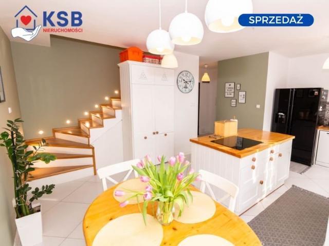 Przestronny dwupoziomowy apartament z tarasem i nowoczesnym wykończeniem