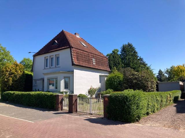 PURNHAGEN IMMOBILIEN Charmantes Einfamilienhaus mit Baugrundstück in zentraler Wohnlage