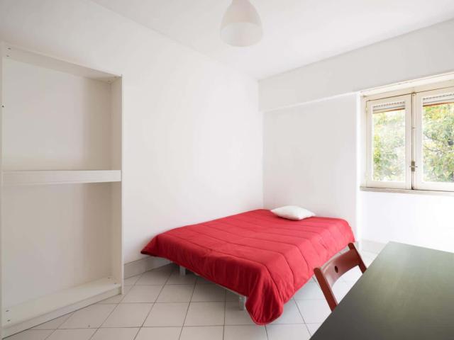 Quarto com cama de casal em residência FLAT PP PP203