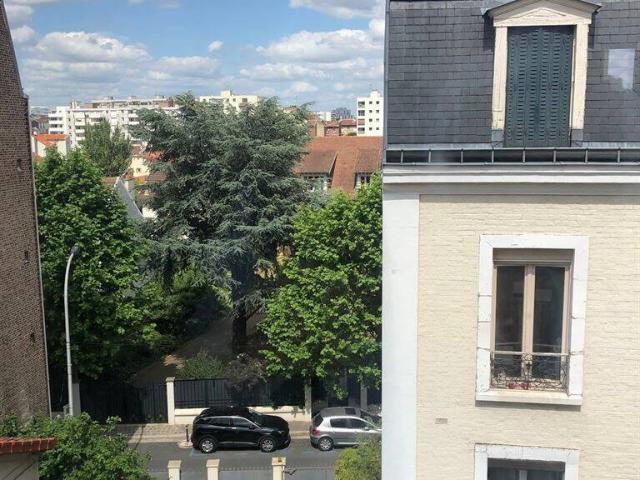 Quartier résidentiel proche commerces et gare
