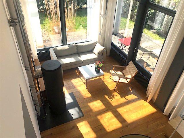 Quiet and sunny suite with garden next to the water