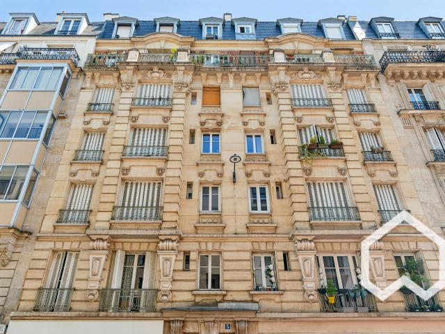 Quiet, secure, and airy apartment Courtyard facing Typical Parisian Haussmannian building