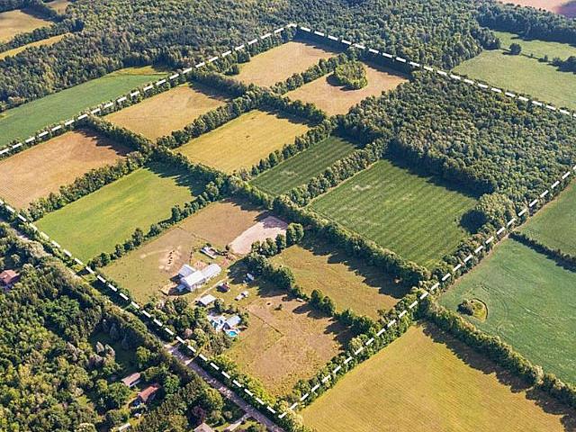 Rare Opportunity To Own 95 acres W/ Five Outbuildings +2 Units!