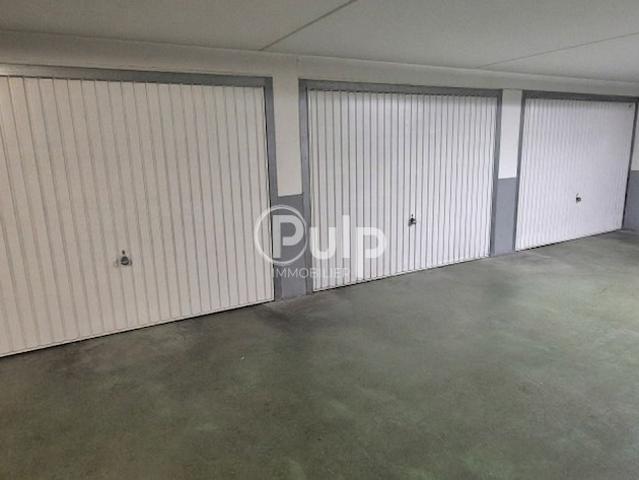 RARE A LA VENTE DOUBLE GARAGE CENTRE VILLE