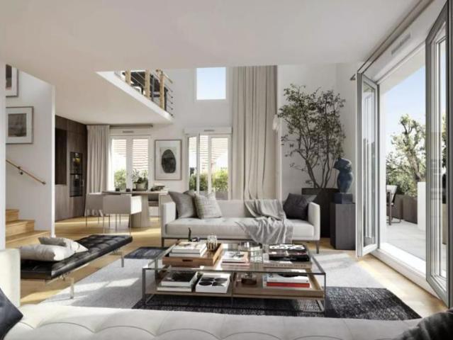 RARE T4 SUD OUEST avec TERRASSE + JARDIN + PARKINGS en COEUR DE VILLE