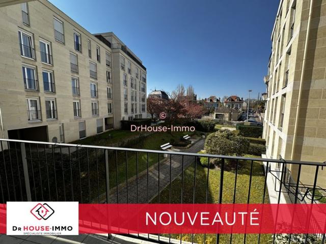 Appartement familial 116 m² 3 chambres, vaste terrasse, double réception, deux parkings proche gare RER