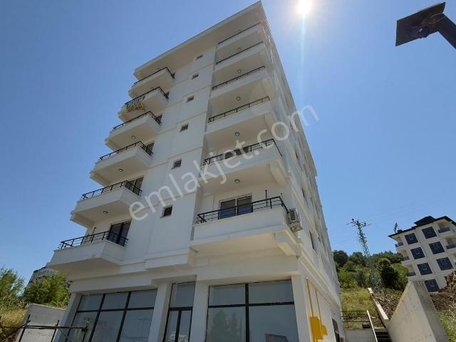 Remax Rahşan Çam | Taflanda Deniz Manzaralı Satılık 1+1 Daire