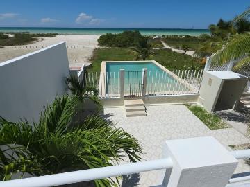 Casa frente al mar en renta, Yucalpetén | 3 recámaras, alberca y terrazas